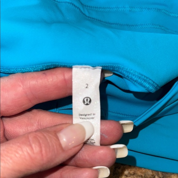Like New Lululemon Athletica Turquoise Leggings with side pockets - Picture 2 of 8